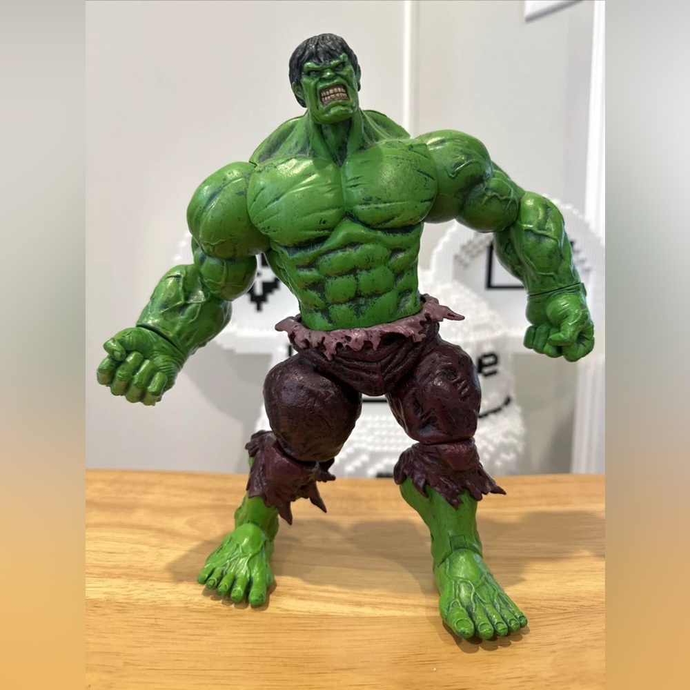 Green and Brown Action Figure